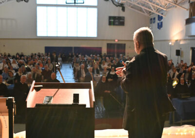 Pro-life Dinner 2026 Father McTeigue on stage